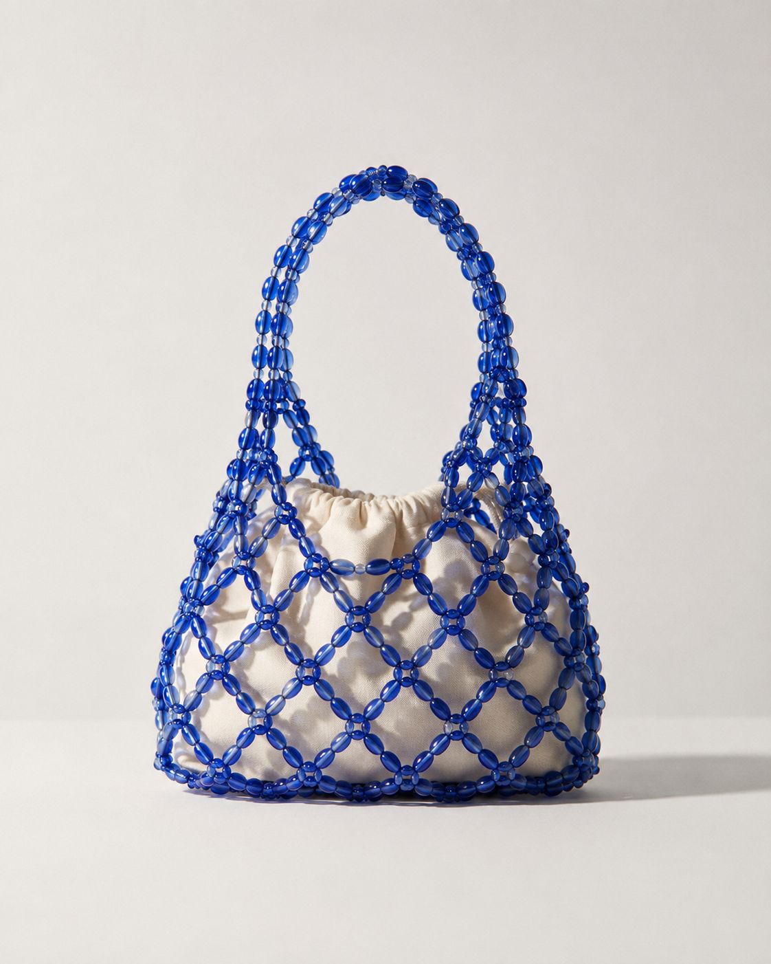 Handtasche mit Perlen